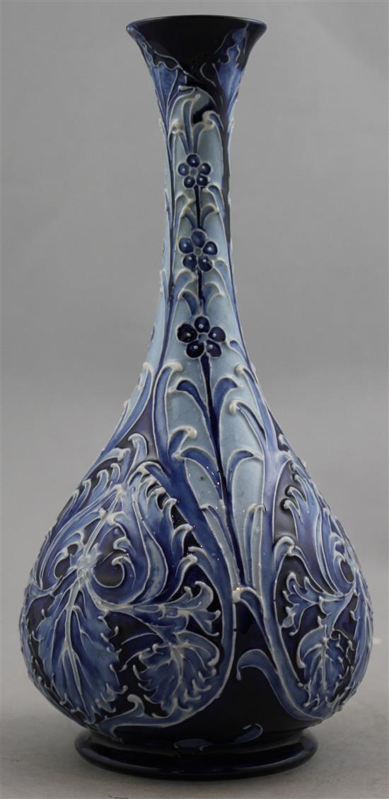 A Macintyre Moorcroft Florian Ware Iris pattern bottle vase, c.1900, 24.5cm